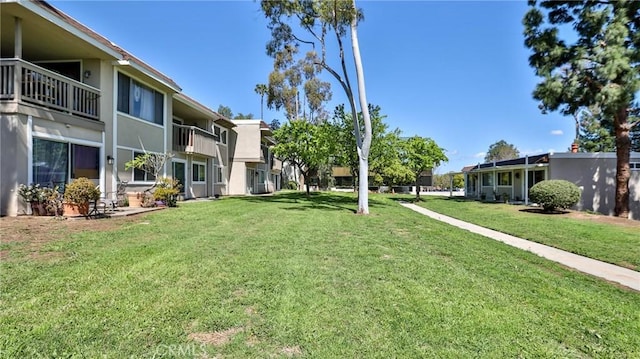 23331 Caminito Basilio Unit 348, Laguna Hills, CA 92653 - view of property's community with a residential view and a lawn