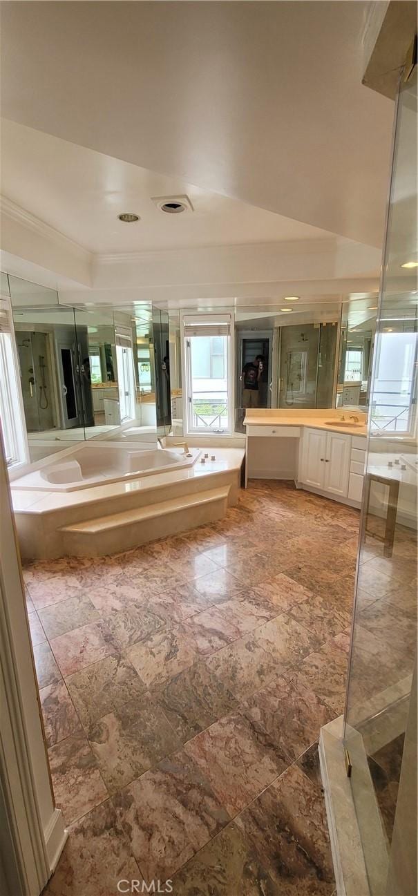 448 N Oakhurst Dr Unit 1, Beverly Hills, CA 90210 - full bathroom with a garden tub, vanity, and a tray ceiling