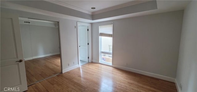 448 N Oakhurst Dr Unit 1, Beverly Hills, CA 90210 - unfurnished bedroom featuring wood finished floors, crown molding, and baseboards