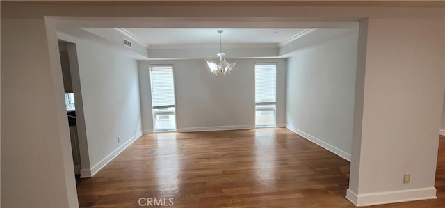 448 N Oakhurst Dr Unit 1, Beverly Hills, CA 90210 - unfurnished dining area with a chandelier, wood finished floors, crown molding, a tray ceiling, and baseboards