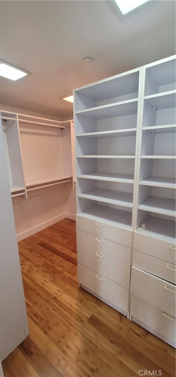 448 N Oakhurst Dr Unit 1, Beverly Hills, CA 90210 - spacious closet with wood finished floors