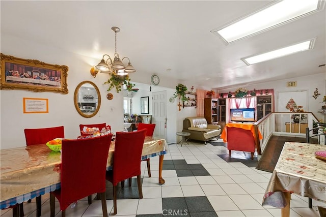 1140 Indian Summer Ave, La Puente, CA 91744 - tiled dining space with a chandelier