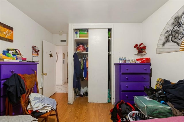 1140 Indian Summer Ave, La Puente, CA 91744 - bedroom featuring wood finished floors and a closet