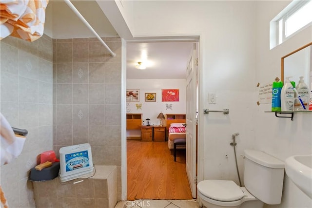 1140 Indian Summer Ave, La Puente, CA 91744 - full bath with tiled shower, toilet, and tile patterned flooring