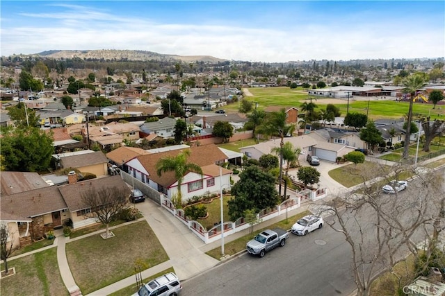 1140 Indian Summer Ave, La Puente, CA 91744 - aerial view of residential area featuring a mountainous background