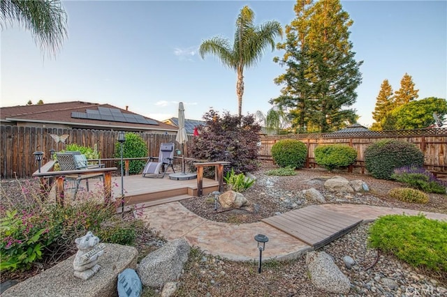 2737 Sussex Ave, Clovis, CA 93611 - fenced backyard with a deck