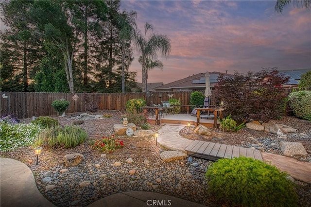 2737 Sussex Ave, Clovis, CA 93611 - fenced backyard with a wooden deck