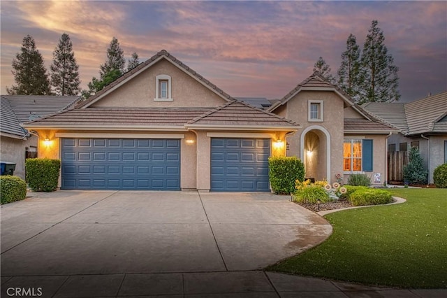 2737 Sussex Ave, Clovis, CA 93611 - traditional-style house featuring stucco siding, concrete driveway, a lawn, an attached garage, and a tile roof