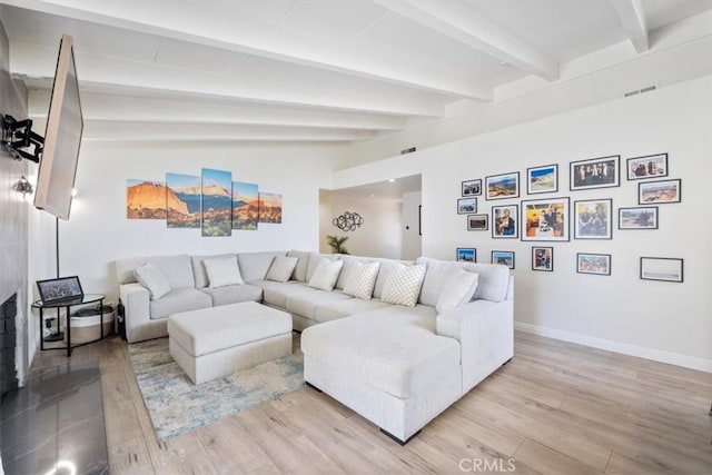 19842 Gilmore St, Woodland Hills, CA 91367 - living area with baseboards and light wood finished floors