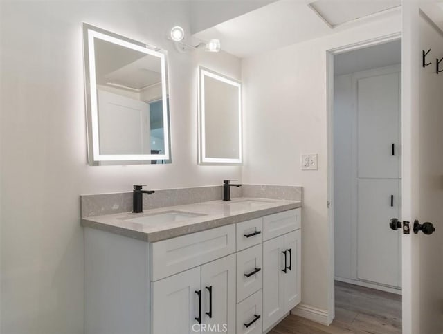 19842 Gilmore St, Woodland Hills, CA 91367 - full bath featuring double vanity and wood finished floors