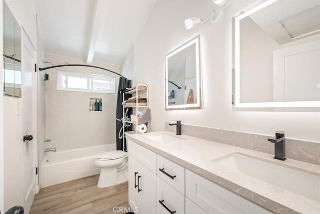 19842 Gilmore St, Woodland Hills, CA 91367 - bathroom featuring shower / bath combination with curtain, double vanity, wood finished floors, and beamed ceiling