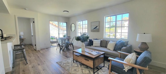 742 Eastshore, Chula Vista, CA 91913 - living room with light wood-style floors and baseboards