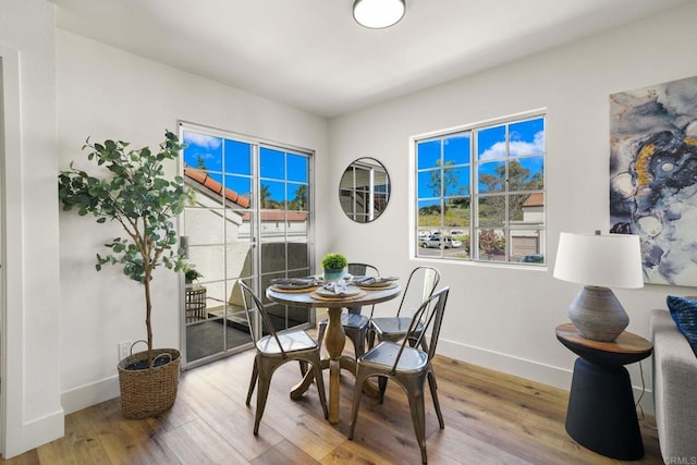 742 Eastshore, Chula Vista, CA 91913 - dining space with baseboards and wood finished floors