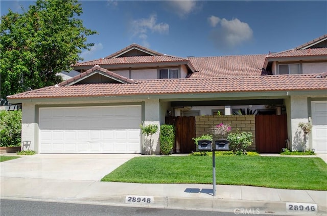 28948 Marilyn Dr, Canyon Country, CA 91387 - view of front of house with stucco siding, a tiled roof, concrete driveway, and a garage