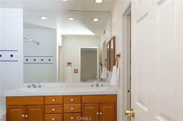 28948 Marilyn Dr, Canyon Country, CA 91387 - full bath featuring double vanity, recessed lighting, and a tile shower