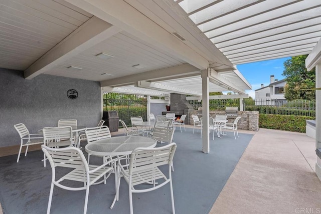 270 Cagney Ln Unit 315, Newport Beach, CA 92663 - view of patio / terrace featuring outdoor dining area, exterior kitchen, and a pergola