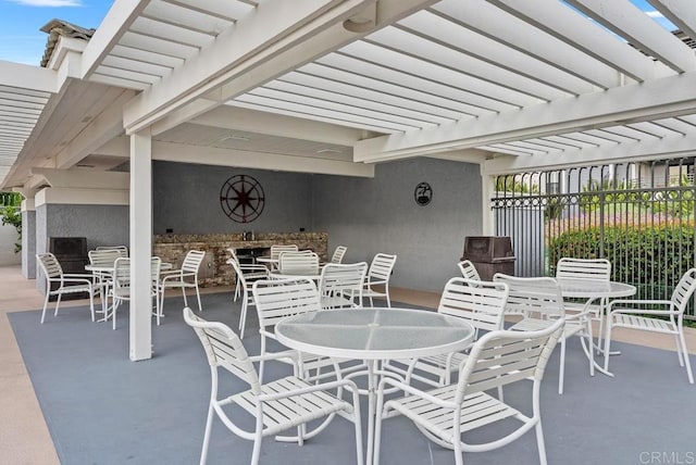 270 Cagney Ln Unit 315, Newport Beach, CA 92663 - view of patio / terrace with outdoor dining area and a pergola