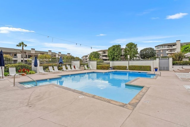 270 Cagney Ln Unit 315, Newport Beach, CA 92663 - community pool featuring a patio