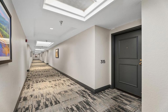 270 Cagney Ln Unit 315, Newport Beach, CA 92663 - hallway with carpet floors, baseboards, and recessed lighting