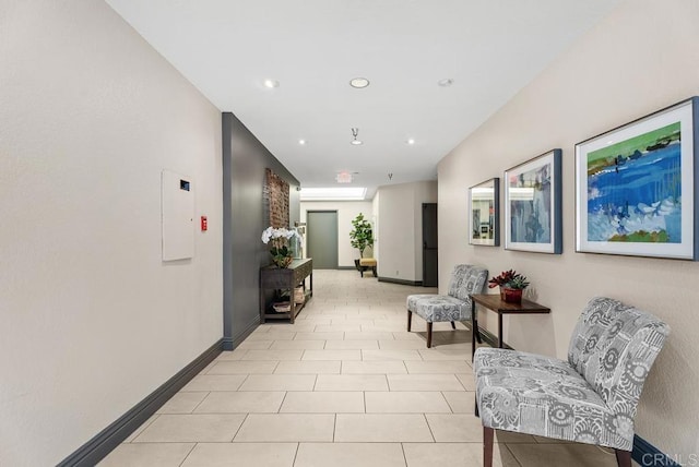 270 Cagney Ln Unit 315, Newport Beach, CA 92663 - corridor featuring baseboards, recessed lighting, and light tile patterned floors
