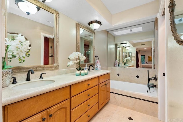 270 Cagney Ln Unit 315, Newport Beach, CA 92663 - bathroom with double vanity, tile patterned floors, and a garden tub