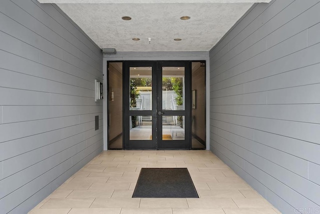270 Cagney Ln Unit 315, Newport Beach, CA 92663 - view of exterior entry featuring french doors