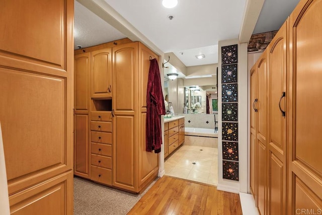 270 Cagney Ln Unit 315, Newport Beach, CA 92663 - spacious closet featuring light wood-style flooring