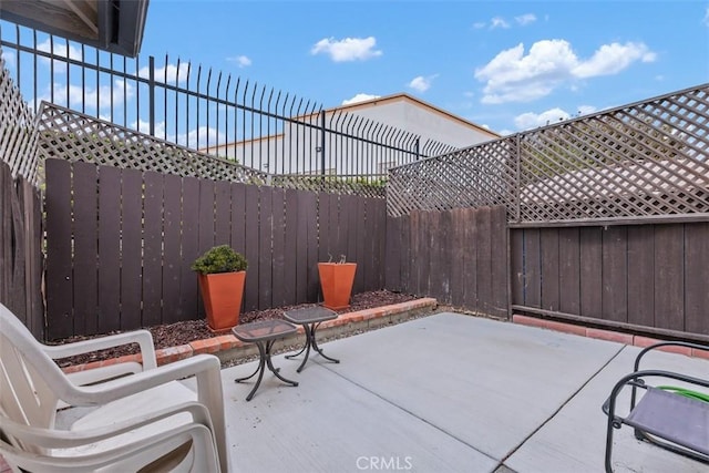 3404 Los Mochis Way, Oceanside, CA 92056 - fenced backyard with a patio area