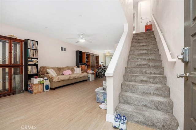 3404 Los Mochis Way, Oceanside, CA 92056 - stairs with wood finished floors, ceiling fan, and french doors