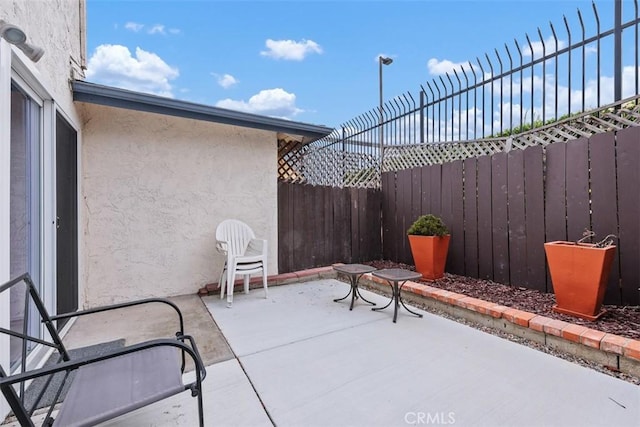 3404 Los Mochis Way, Oceanside, CA 92056 - fenced backyard with a patio