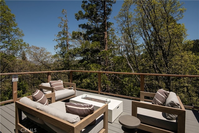 357 Mittry Ln, Lake Arrowhead, CA 92352 - wooden deck with an outdoor living space with a fire pit