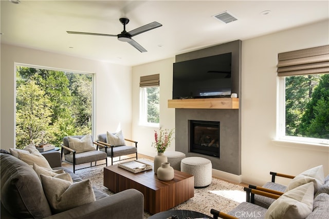 357 Mittry Ln, Lake Arrowhead, CA 92352 - living room with a fireplace, a ceiling fan, and baseboards
