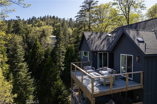 357 Mittry Ln, Lake Arrowhead, CA 92352 - rear view of house with a wooded view and a deck