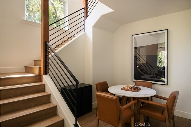 357 Mittry Ln, Lake Arrowhead, CA 92352 - dining area featuring baseboards, wood finished floors, and stairway
