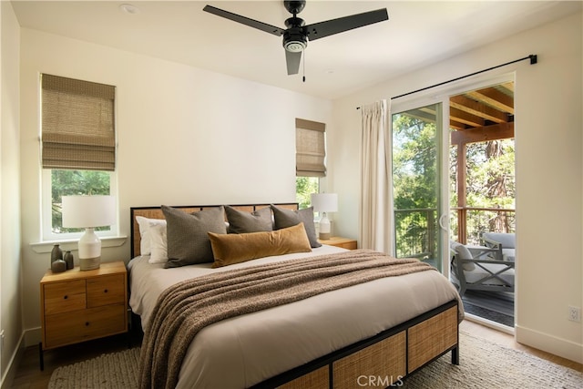 357 Mittry Ln, Lake Arrowhead, CA 92352 - bedroom featuring access to exterior, baseboards, wood finished floors, and a ceiling fan