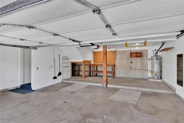 949 W Imperial Blvd Unit 14C, La Habra, CA 90631 - garage with strapped water heater and a garage door opener