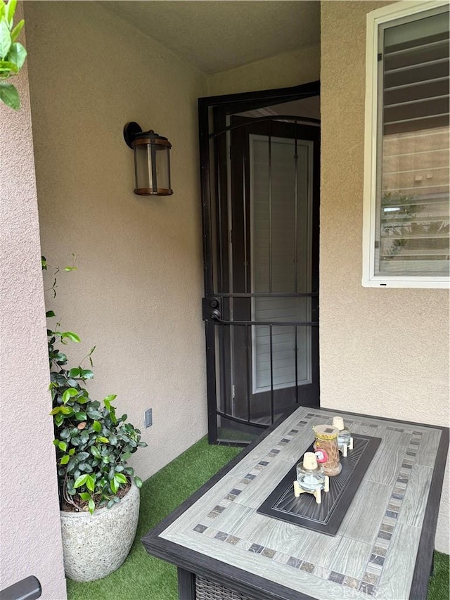 41410 Juniper St Unit 2012, Murrieta, CA 92562 - view of exterior entry featuring stucco siding