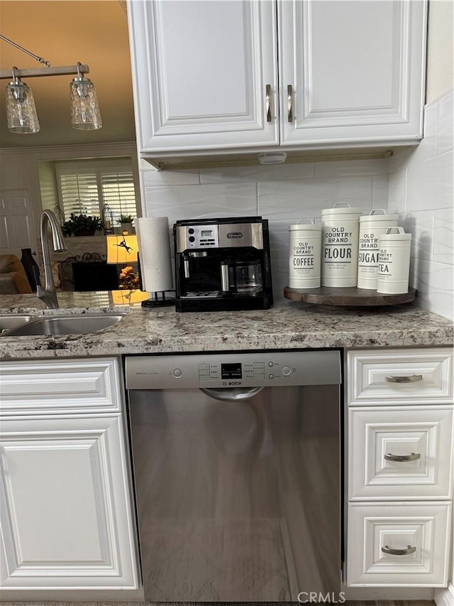 41410 Juniper St Unit 2012, Murrieta, CA 92562 - kitchen featuring stainless steel dishwasher, a sink, white cabinets, and tasteful backsplash