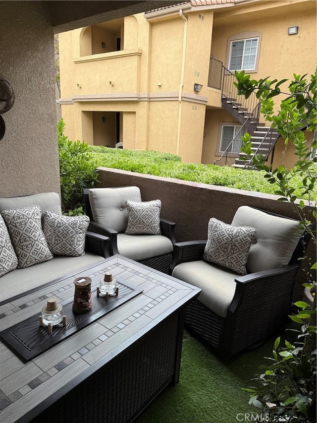 41410 Juniper St Unit 2012, Murrieta, CA 92562 - balcony featuring an outdoor hangout area and stairway