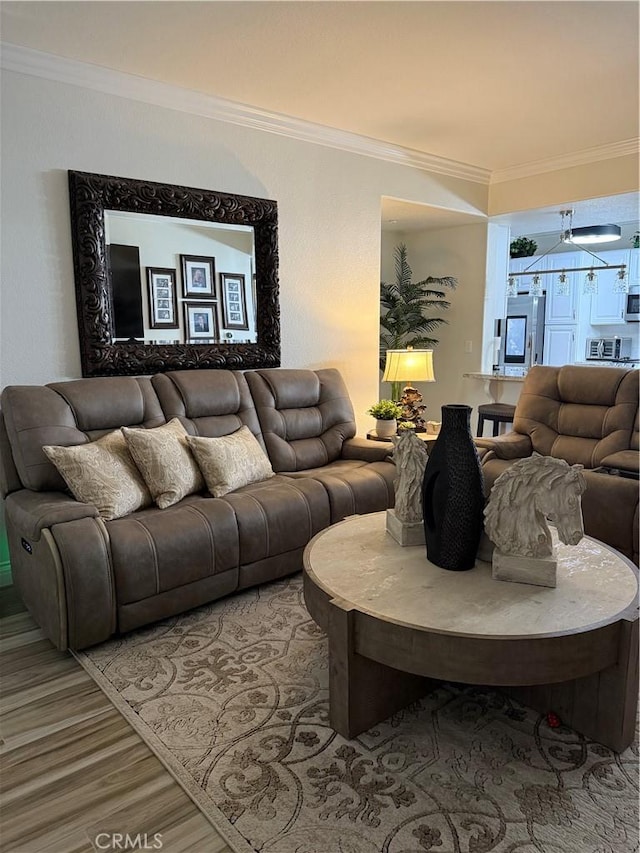 41410 Juniper St Unit 2012, Murrieta, CA 92562 - living area featuring crown molding and wood finished floors
