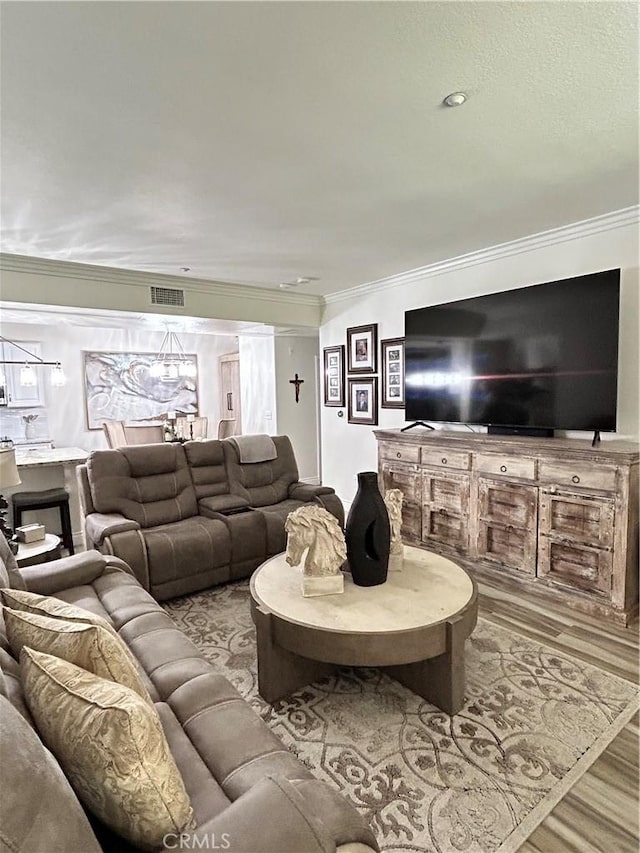 41410 Juniper St Unit 2012, Murrieta, CA 92562 - living area with ornamental molding and wood finished floors
