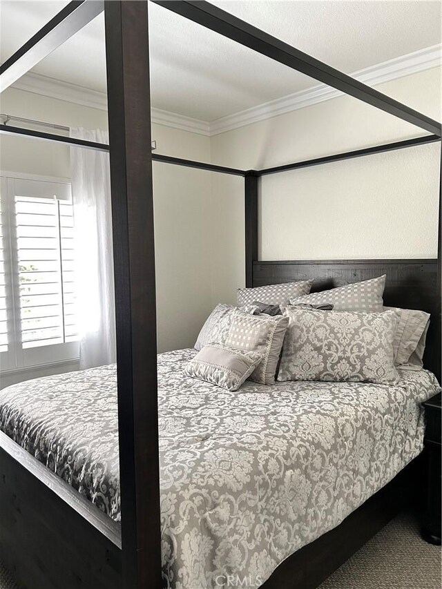 41410 Juniper St Unit 2012, Murrieta, CA 92562 - bedroom featuring crown molding and carpet flooring
