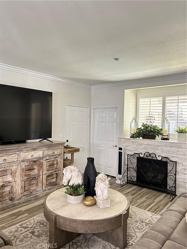 41410 Juniper St Unit 2012, Murrieta, CA 92562 - living room featuring light wood-type flooring and ornamental molding