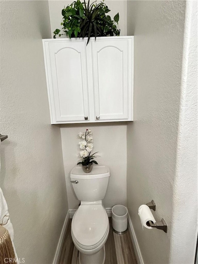 41410 Juniper St Unit 2012, Murrieta, CA 92562 - bathroom with baseboards and wood finished floors