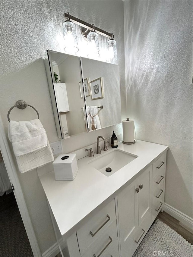 41410 Juniper St Unit 2012, Murrieta, CA 92562 - bathroom with vanity and a textured wall