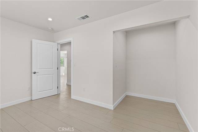 7714 Kyle St, Tujunga, CA 91042 - unfurnished room with baseboards and recessed lighting
