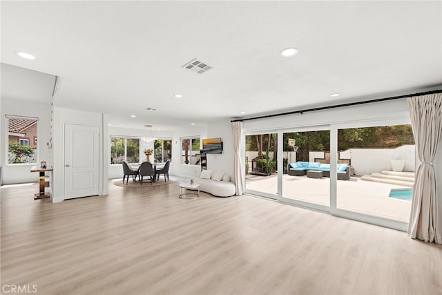 597 Rancheria Rd, Diamond Bar, CA 91765 - unfurnished living room with light wood-type flooring and recessed lighting