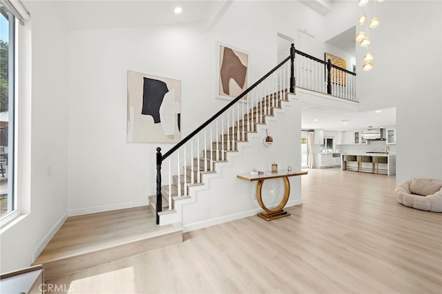 597 Rancheria Rd, Diamond Bar, CA 91765 - entrance foyer with healthy amount of natural light, wood finished floors, stairs, a towering ceiling, and recessed lighting