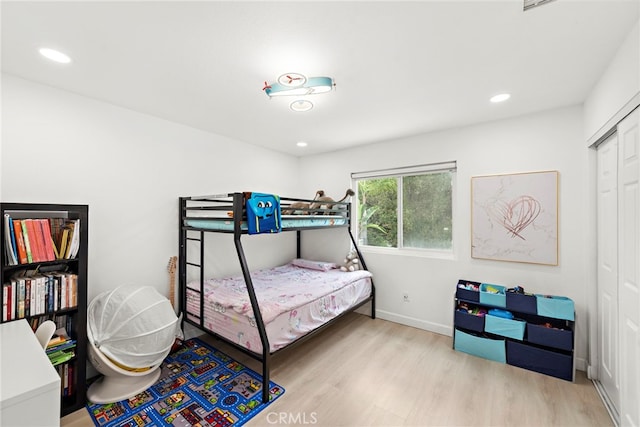 597 Rancheria Rd, Diamond Bar, CA 91765 - bedroom featuring wood finished floors, a closet, baseboards, and recessed lighting