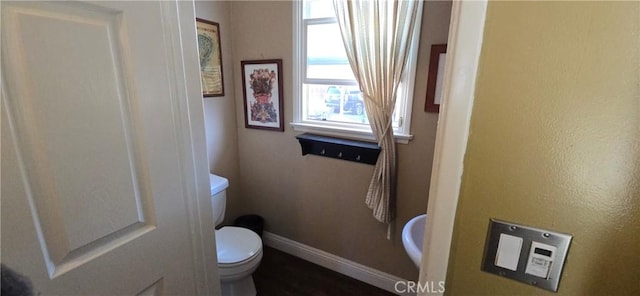 16701 Chatsworth St, Granada Hills, CA 91344 - bathroom featuring toilet and baseboards